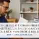 Business owner reviewing sales and cost data to calculate gross profit on a laptop